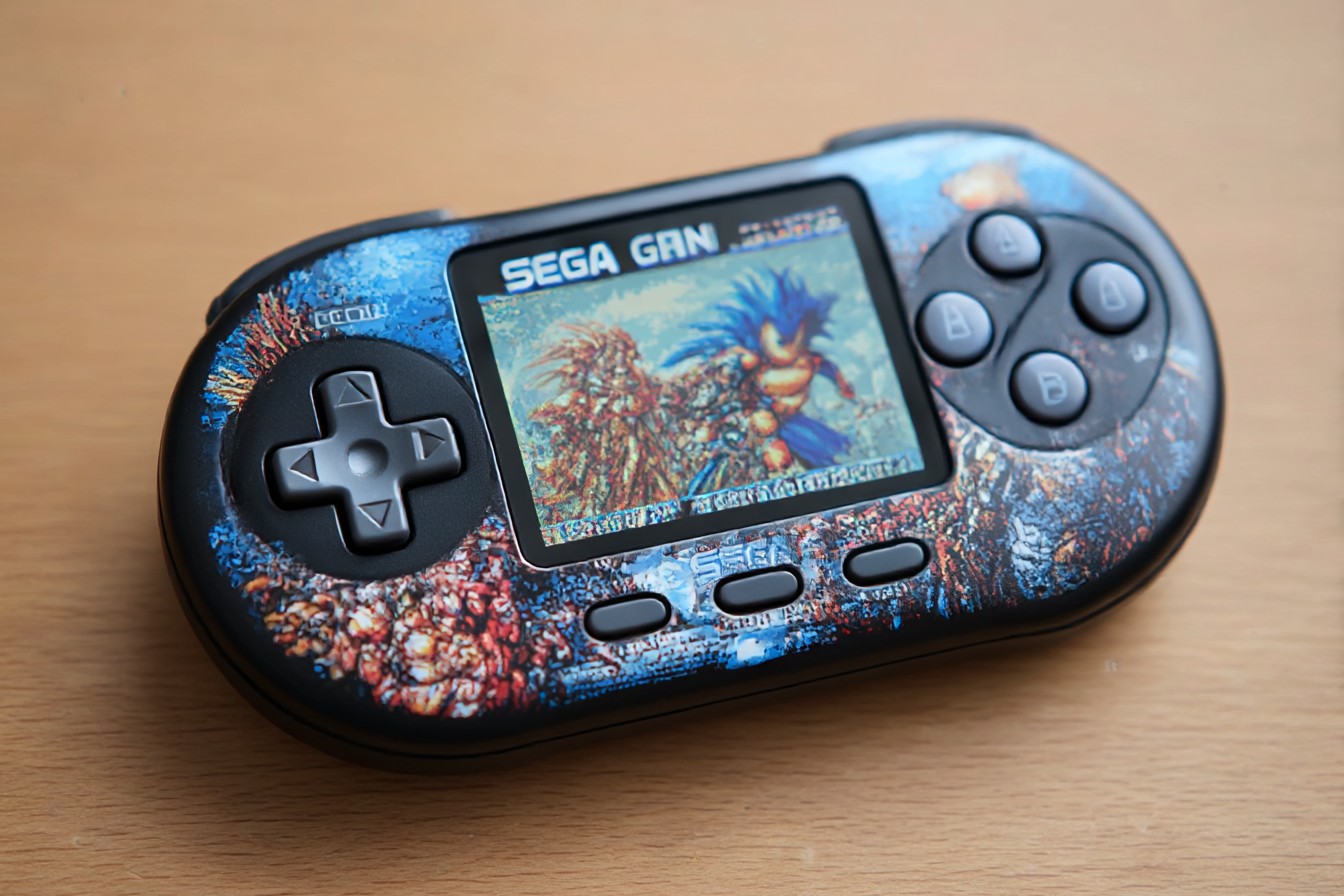 im1979_sega_genesis_handheld_console_16_bit_inspired_16_bit_a_252b1f39-b726-416f-8c4a-05c063765fe0_0